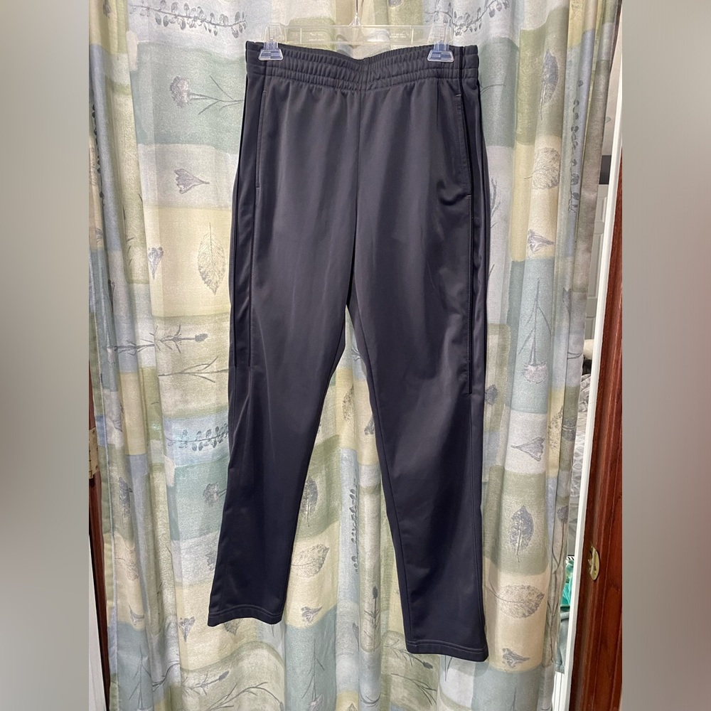 Men's Tek Gear workout pants. Gray with black side stripes. Size small.